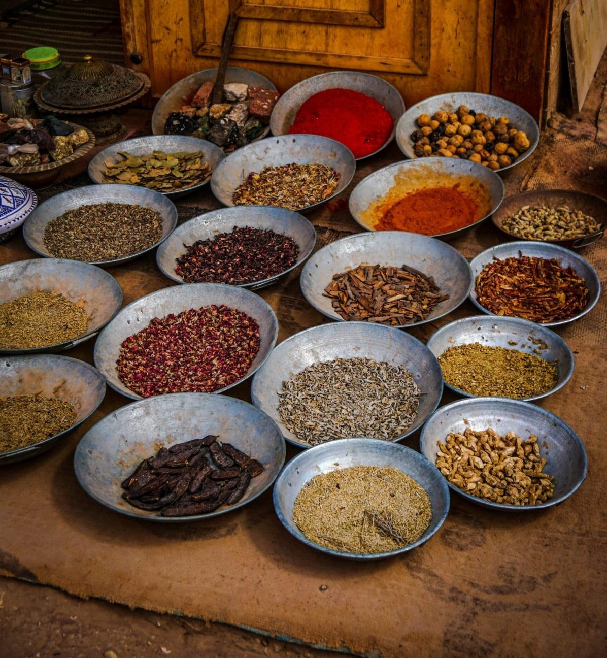 Bowls filled with different Chinese herbs